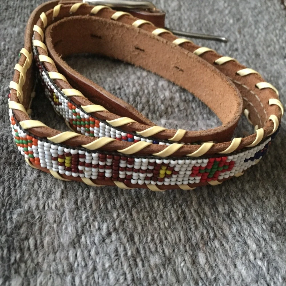 Vintage beaded belt size 26. Firebird design.